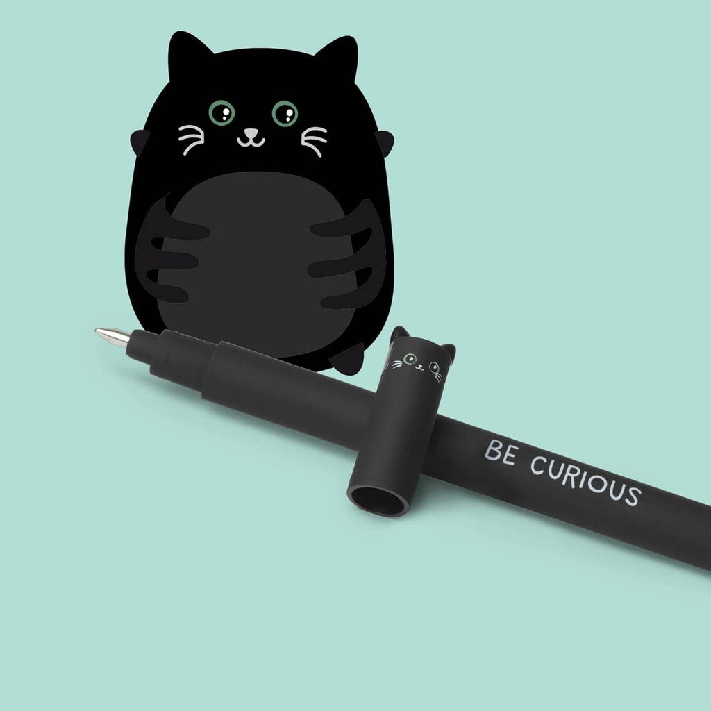 Black erasable gel pen with cat cap and “BE CURIOUS” text on the barrel