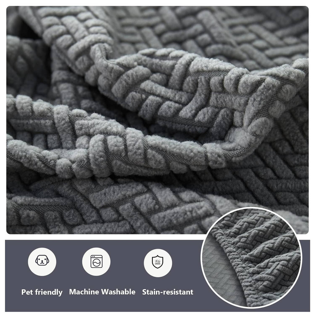 Gray textured cushion cover fabric detail with thick raised pattern and stitching