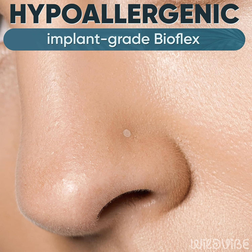 Transparent L-shaped nose stud retainer in a nostril, discreet flat disc end