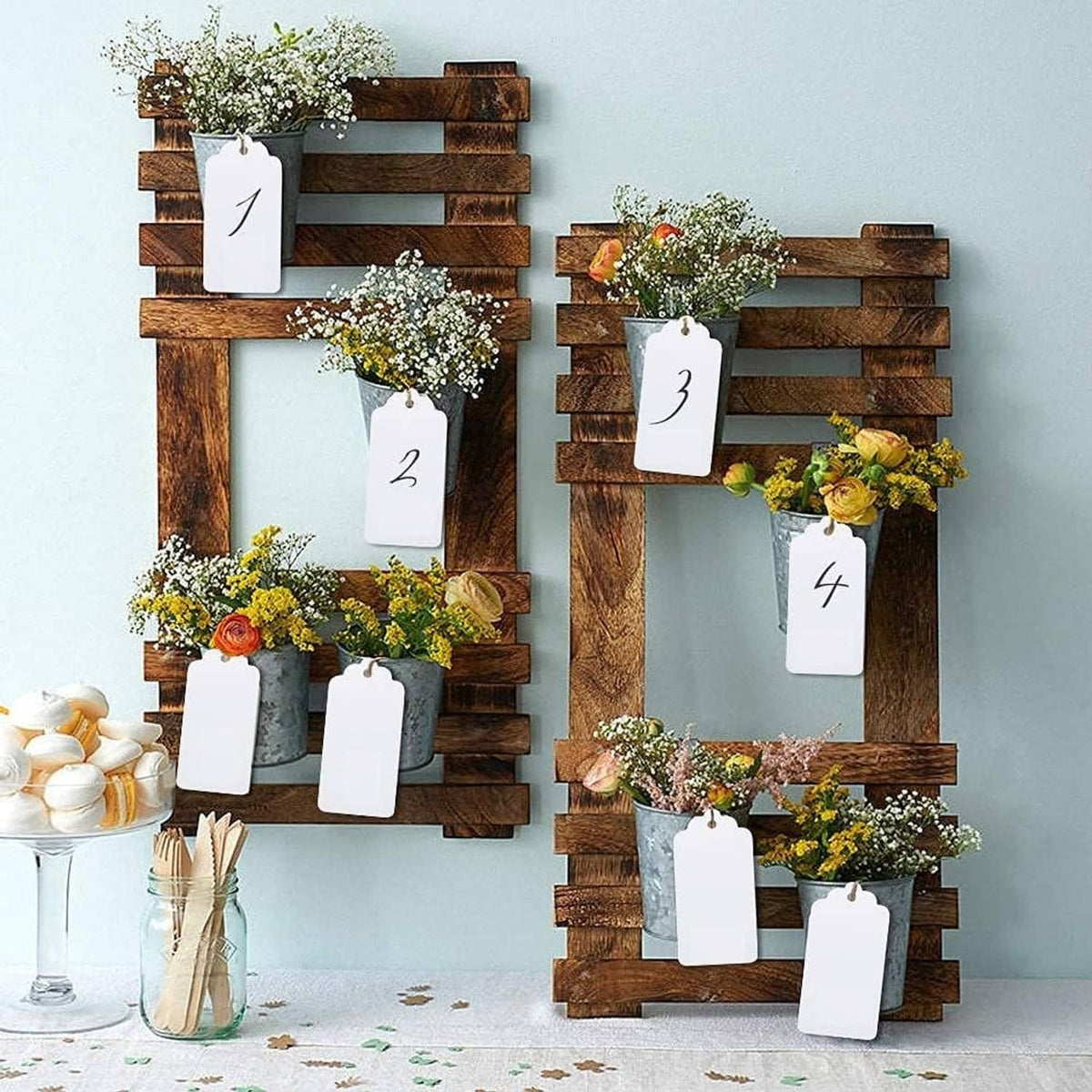 White blank paper gift tags attached to twine, multiple tags shown