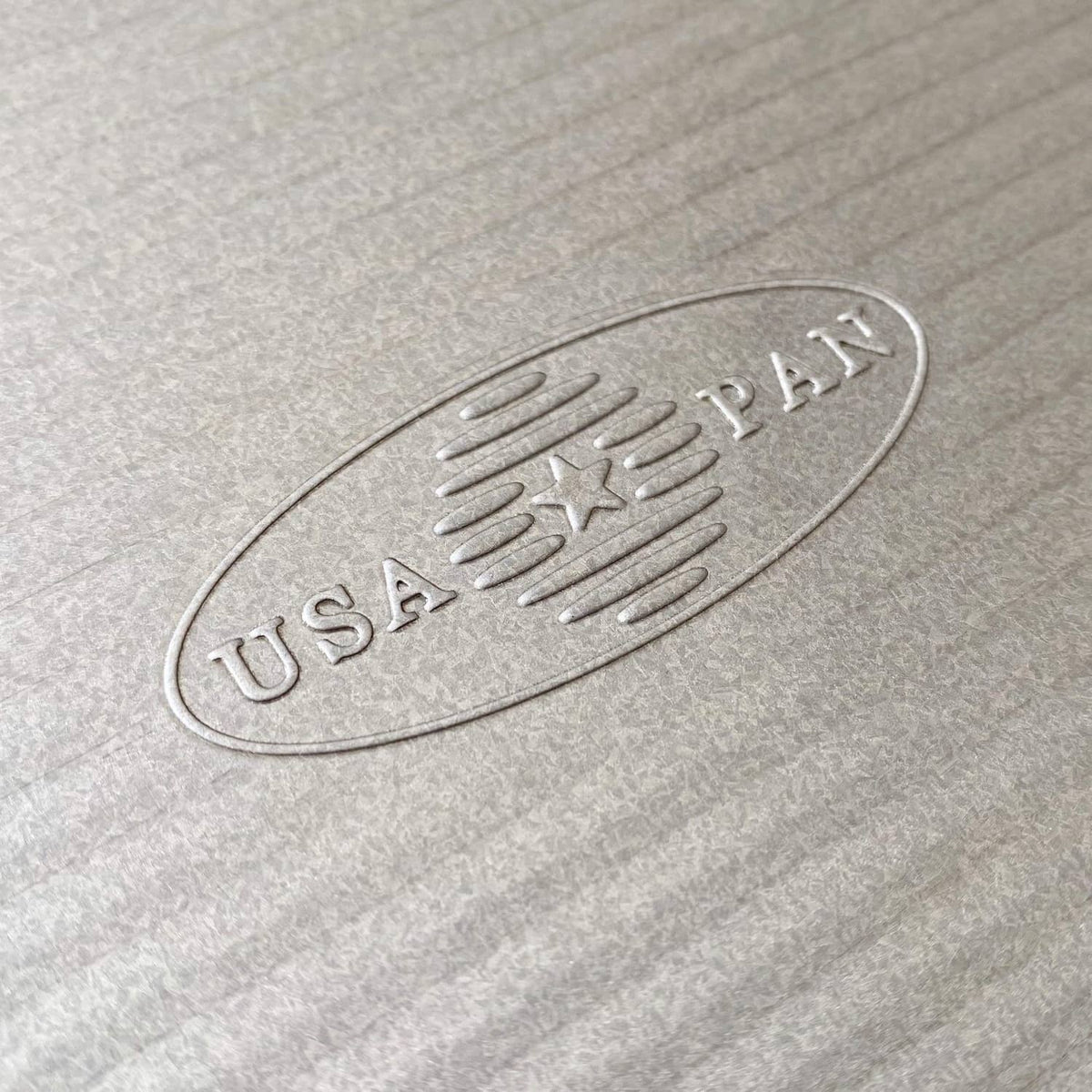 Embossed USA Pan mark on aluminized steel quarter sheet pan