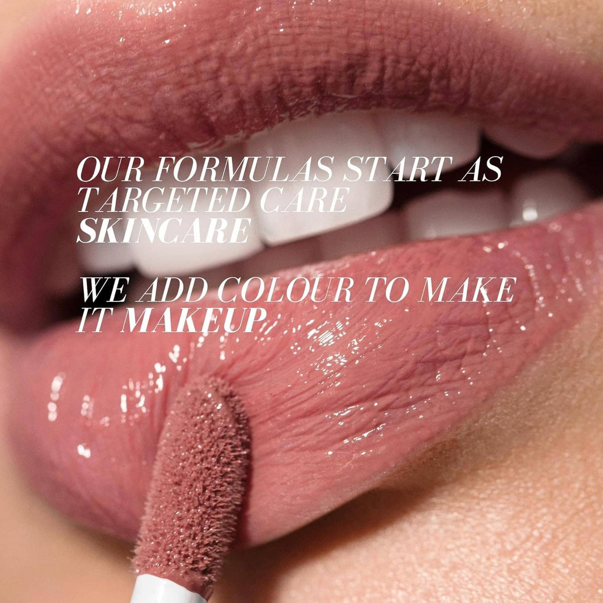 Nude rose lip gloss serum swatch on lips with plush applicator tip