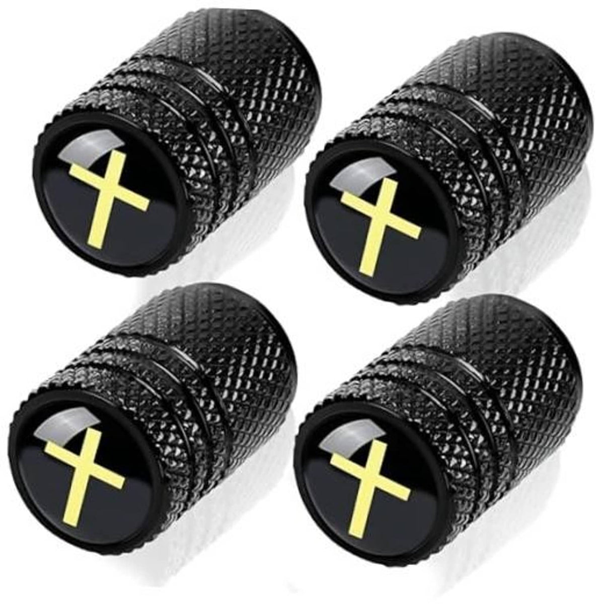 Set of four black metal tire valve stem caps with yellow cross inserts