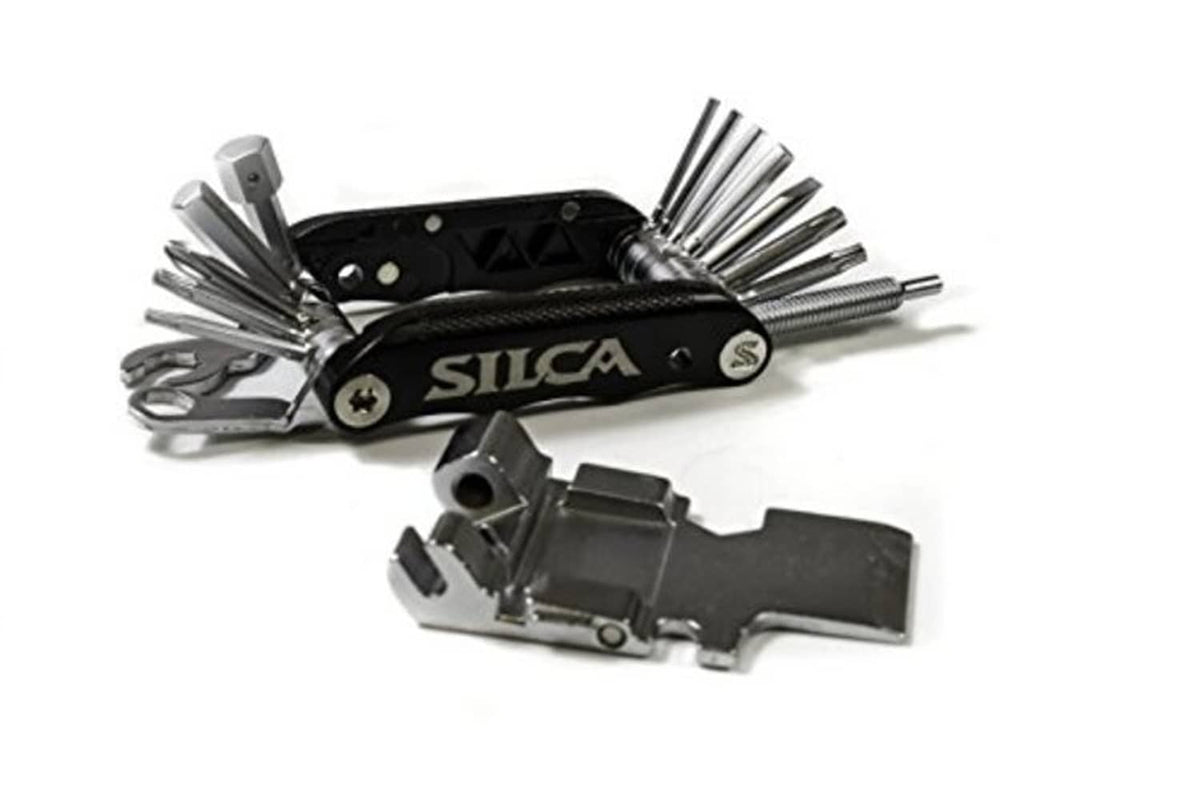 SILCA multi-tool with black handle and extended tools, including wrench-like blade