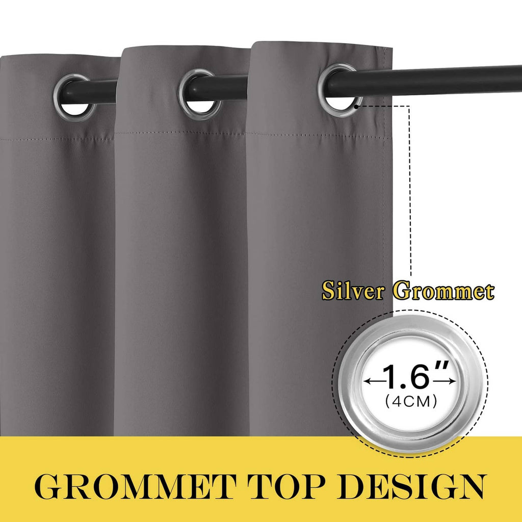 Grey blackout curtain panels with silver grommets along the top header