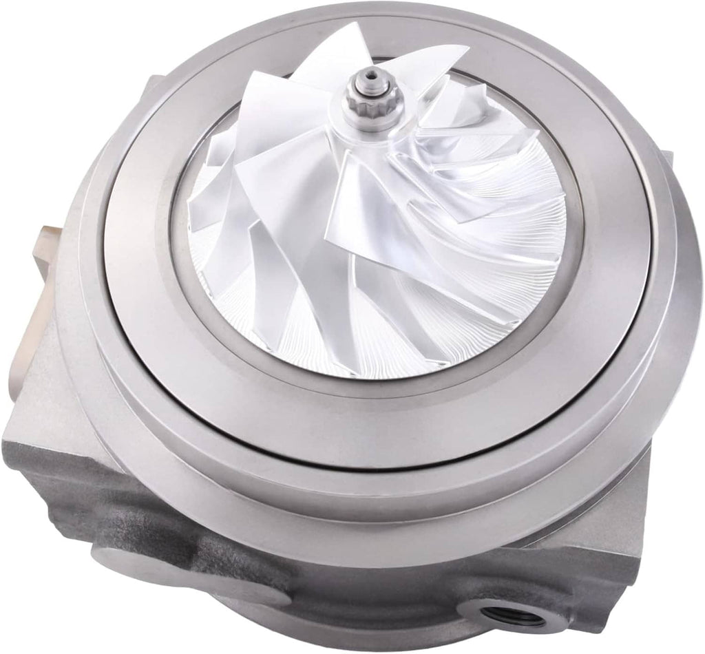 Turbo cartridge turbocharger, front view with silver turbine wheel and circular housing