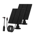 Black flexible solar panel with adjustable dual stands and coiled charging cable