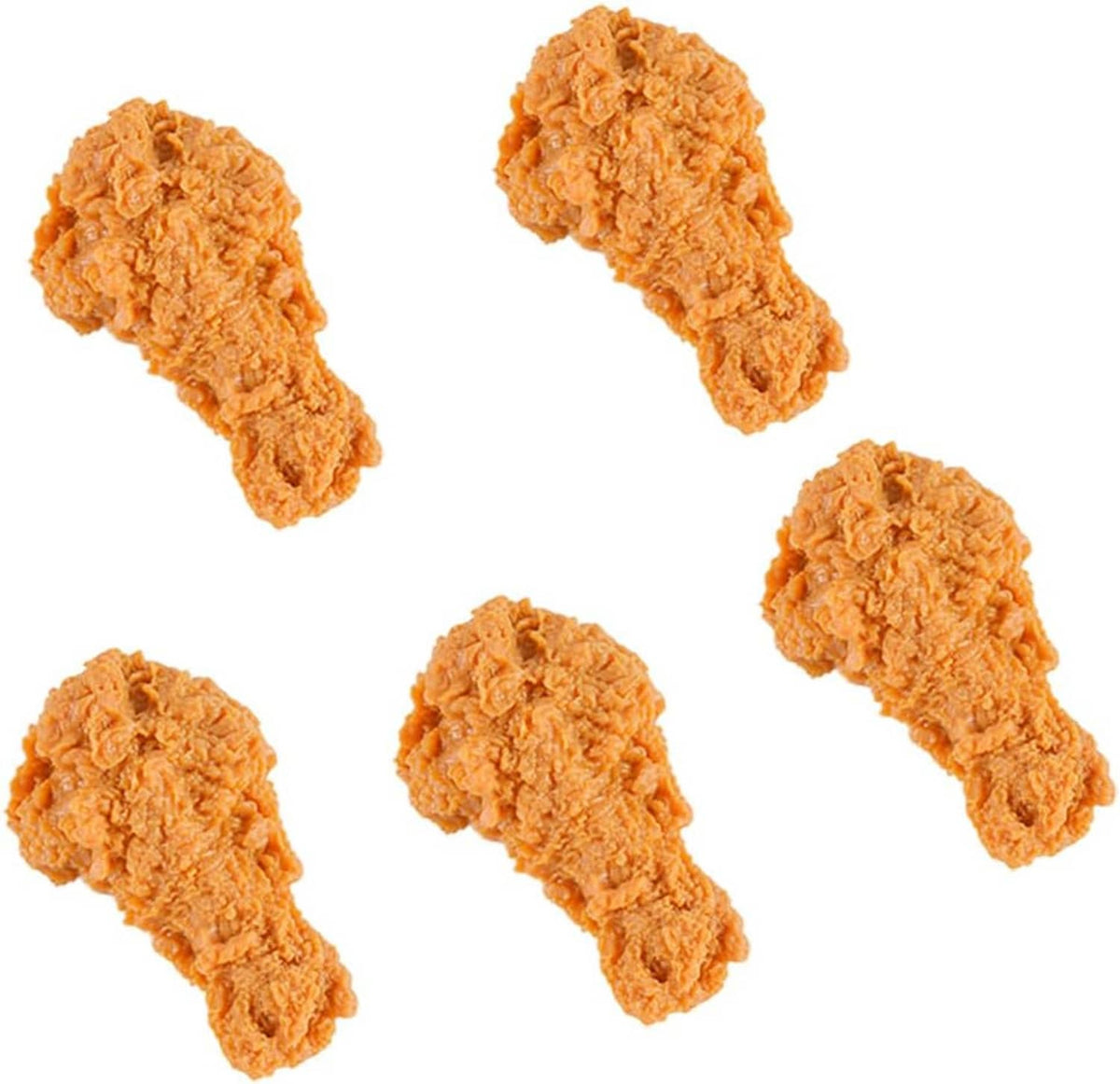 Five faux fried chicken drumsticks, orange-brown, textured simulated chicken legs.