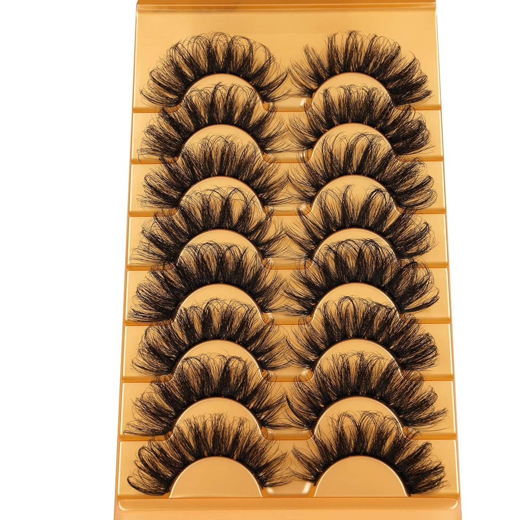 Set of curly false eyelashes arranged in a tray, dark fluffy lashes with curved bands
