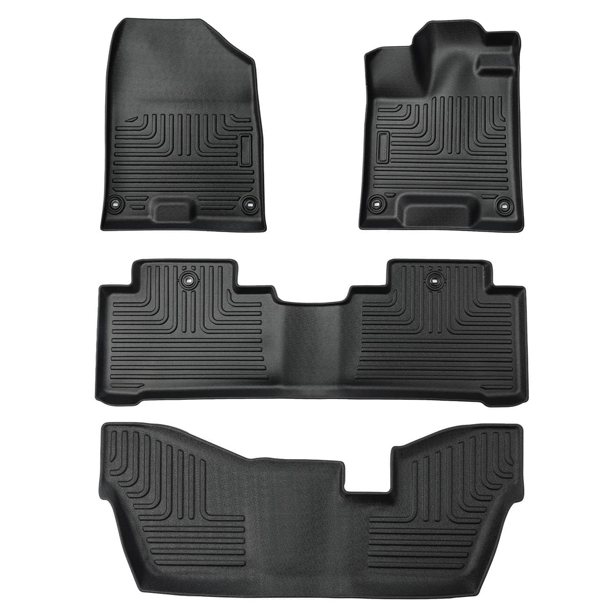 Black rubber floor mat set with molded contours, raised channels, and center cutout
