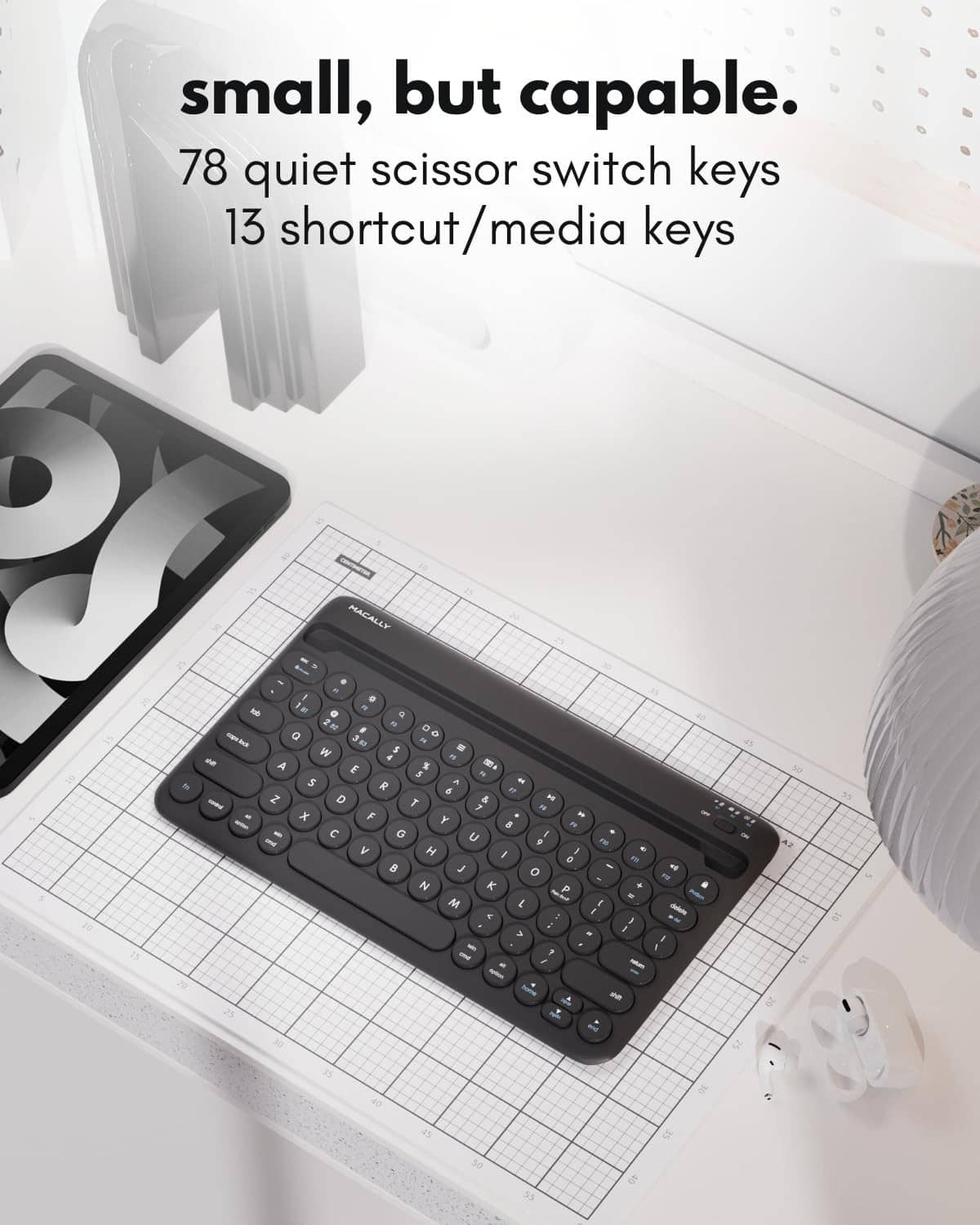 Black Bluetooth keyboard top view with compact key layout