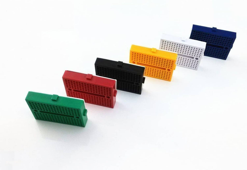 Mini solderless breadboards in green, red, black, white, blue, and yellow, 12-pack.