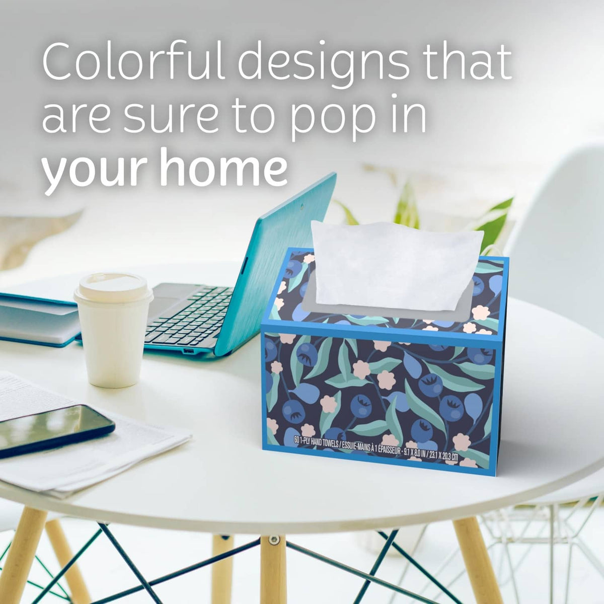 Kleenex hand towel box with white paper towel, colorful leaf design