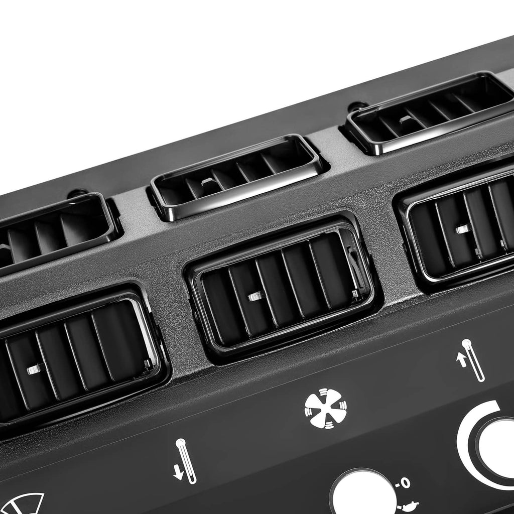 A/C heat control panel bezel close-up of vent grilles and airflow control markings