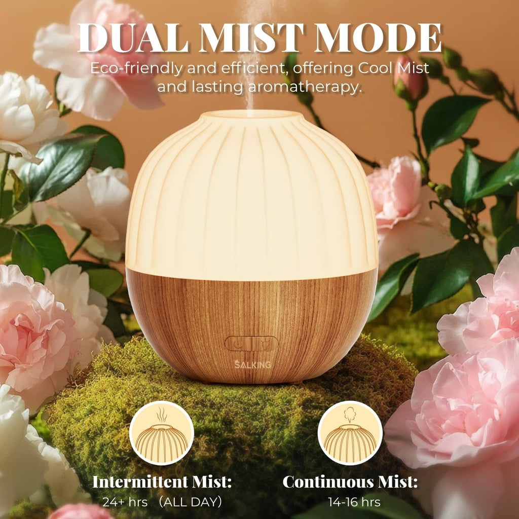 Wood-and-white essential oil diffuser emitting mist from the top
