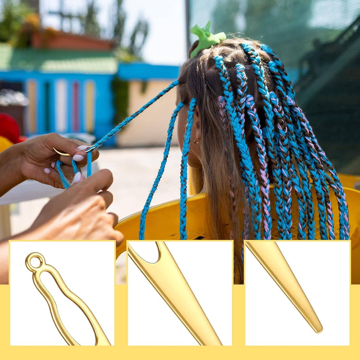 Gold crochet needle tool with hook held near blue braided hair