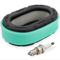 Engine air filter with teal foam and black rubber gasket, plus silver spark plug