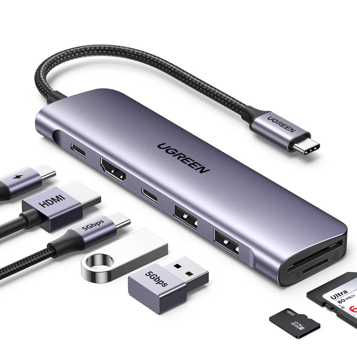 Space gray USB-C docking hub with braided cable, HDMI, USB ports, and card slot