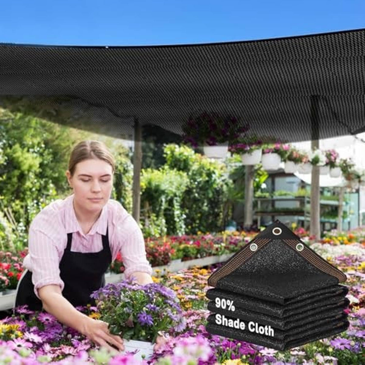 Black shade cloth sun shade net, folded with reinforced corner grommet tabs