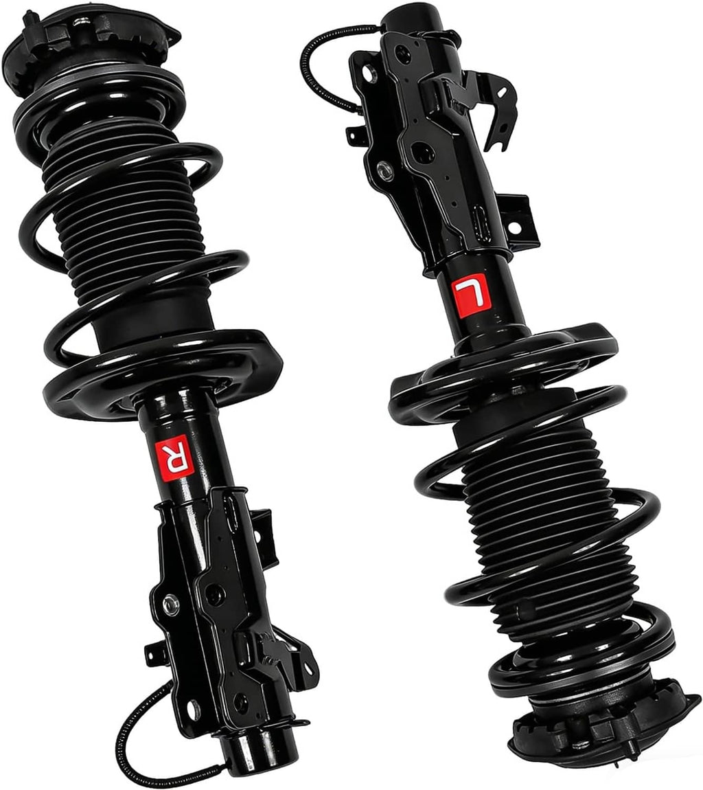 Pair of front suspension struts with black coil springs and wiring harness