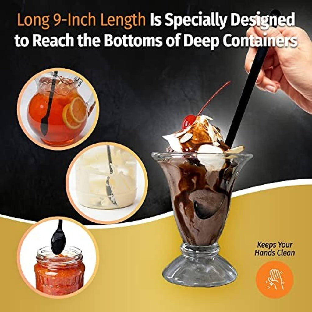 Hand holding a black long-handle spoon above a layered drink in a glass