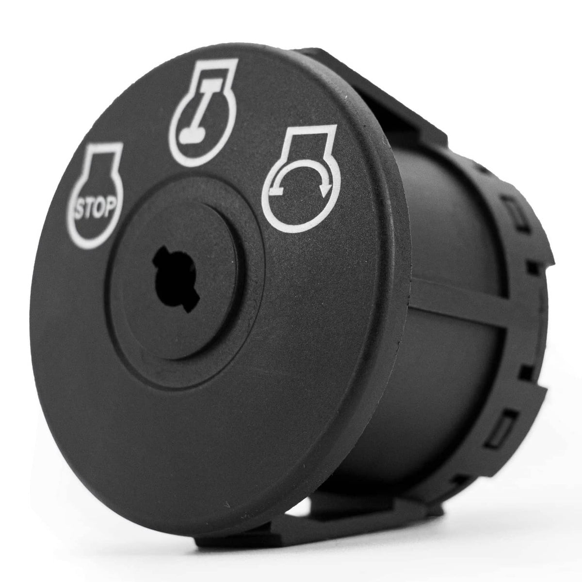 Black tractor ignition switch with key slot, round panel with STOP and power icons