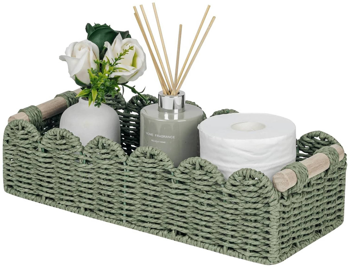 Green scalloped woven toilet paper storage basket with rolled wood handles