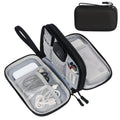 Black zippered travel cable organizer pouch with mesh slots and elastic compartments