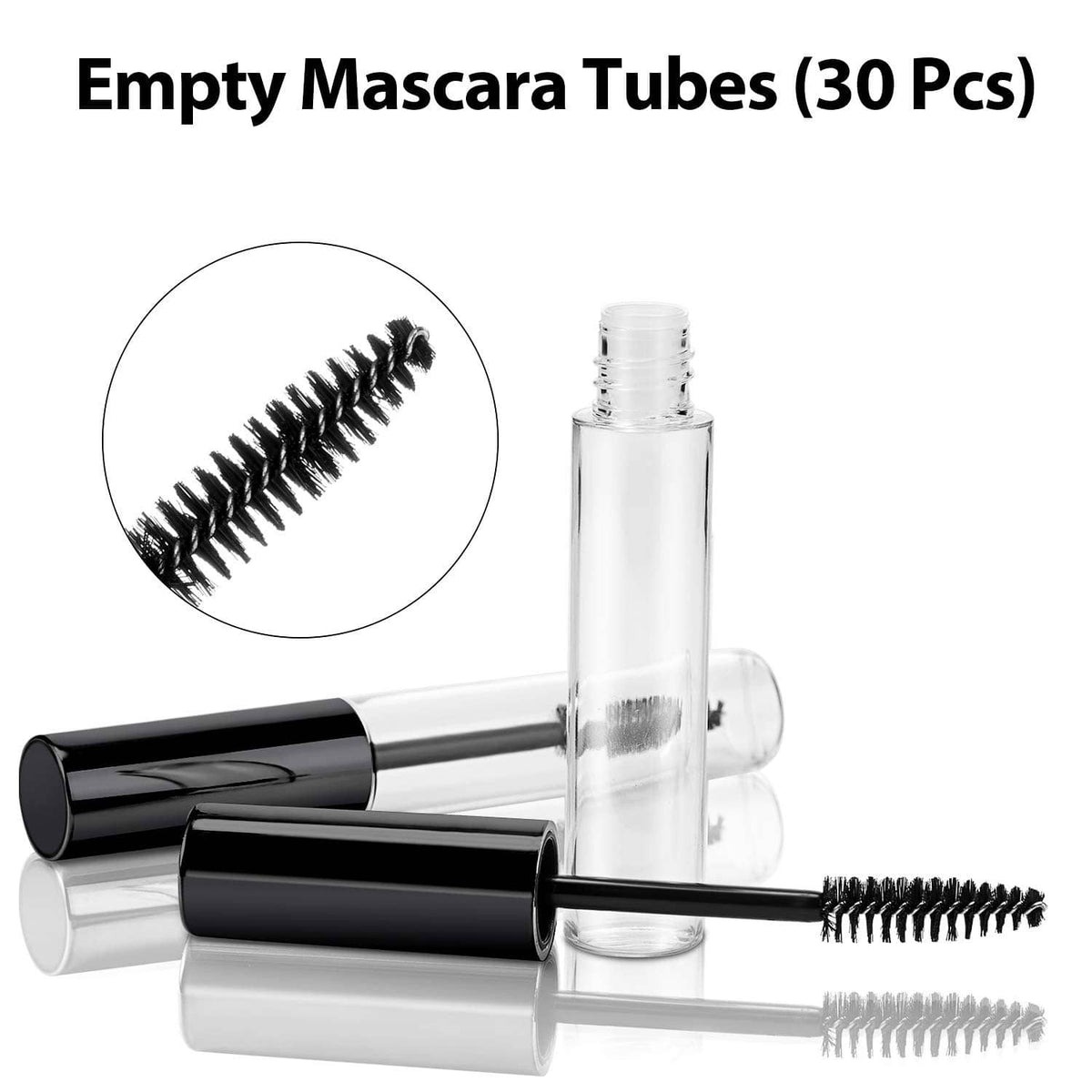 Empty mascara tubes with clear bodies and black wand brush, close-up bristle view