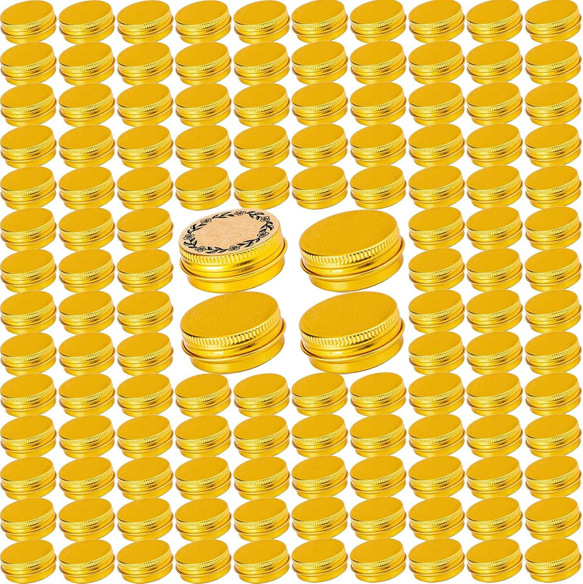 Bulk pack of small gold screw-top aluminum tins with flat lids, stacked in rows