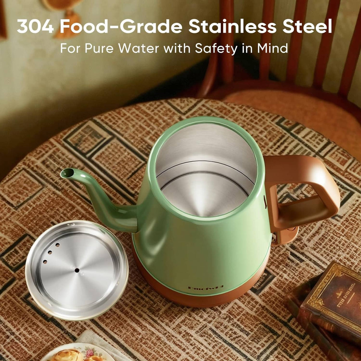 Green electric gooseneck kettle with open top, showing stainless-steel interior