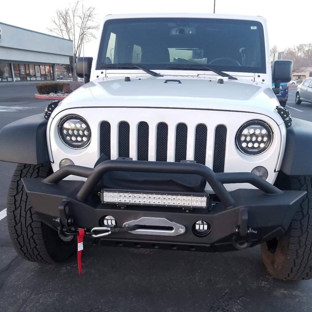 Front view of white off-road vehicle with mounted LED light bar