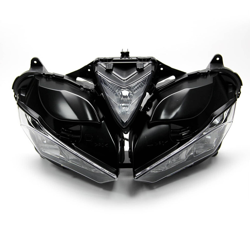 Front headlight assembly, symmetrical clear lenses with black center and side housings.