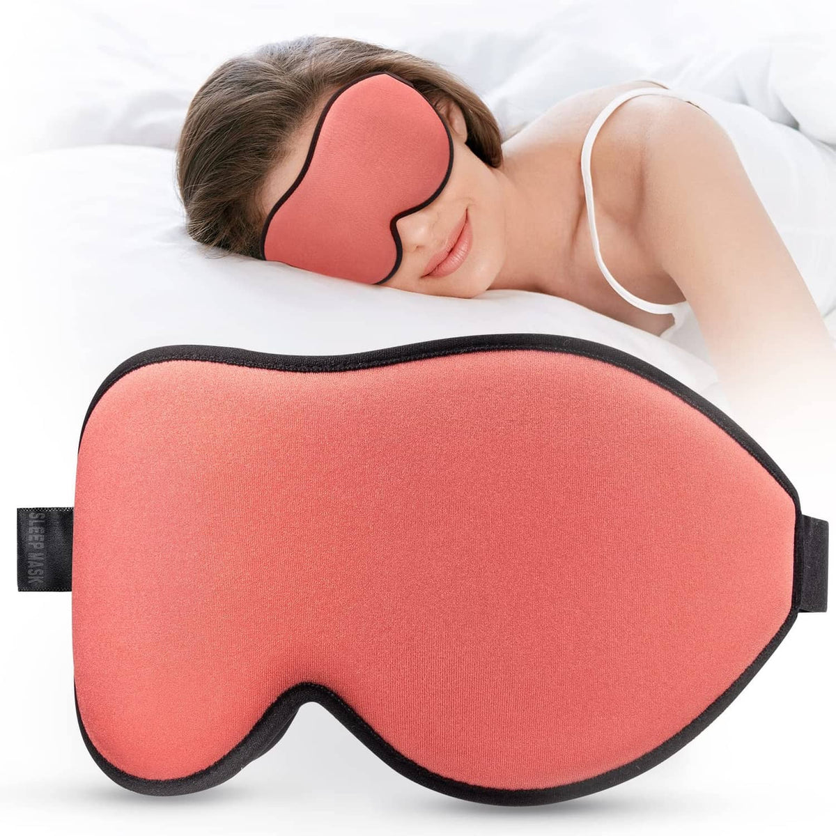 Coral red contoured sleep eye mask with black trim and soft foam edging