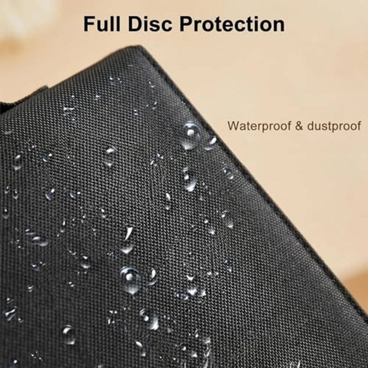 Black fabric disc case with water- and dust-resistant surface, beaded water droplets