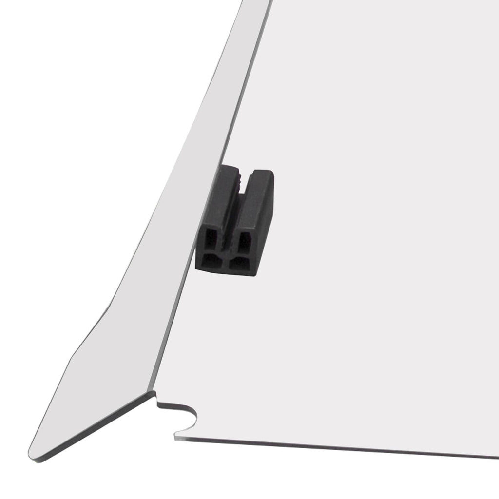Close-up of a clear windscreen corner with black mounting block and metal frame edge