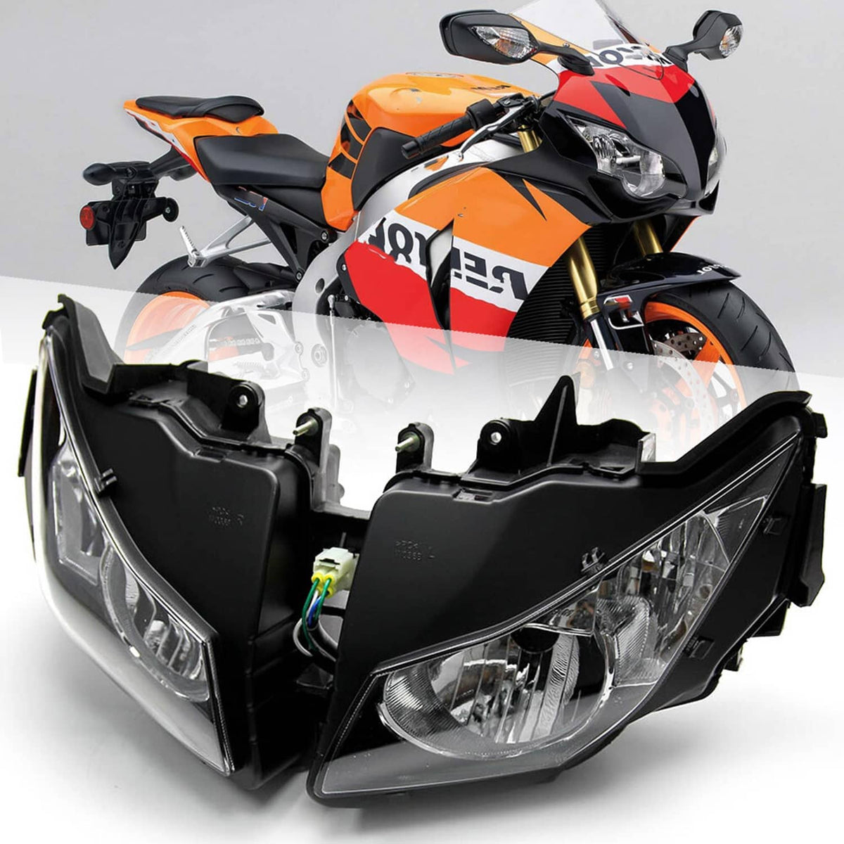 Front headlight assembly pair with black housings and clear lenses, mounted on sport bike.