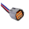 Grey multi-pin throttle body connector with orange terminal insert and red/blue wires
