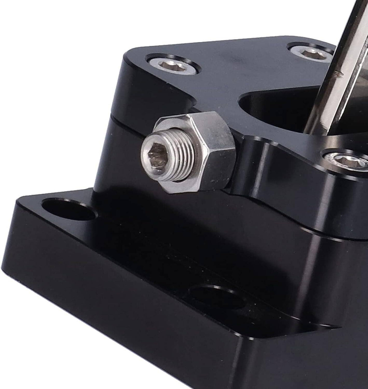 Close-up of black billet shifter base with threaded stud, bolts, and lever joint