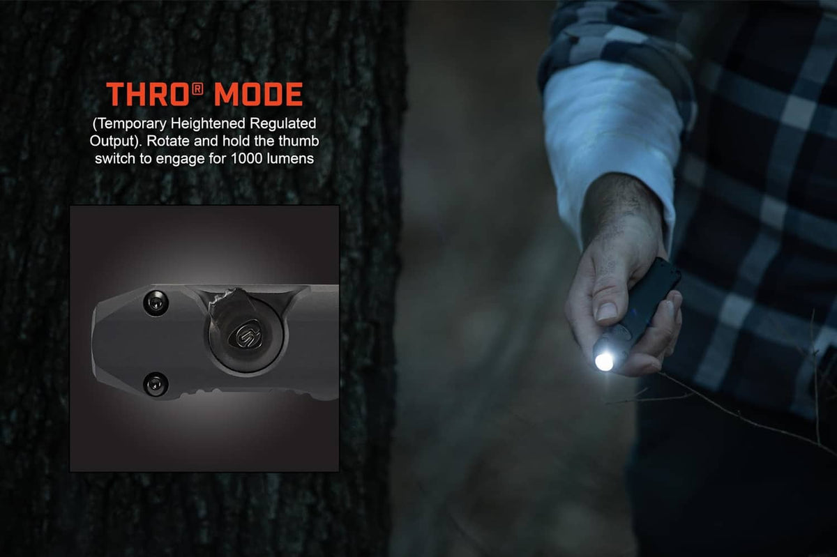 Rechargeable EDC flashlight in hand with beam lighting, close-up of switch area