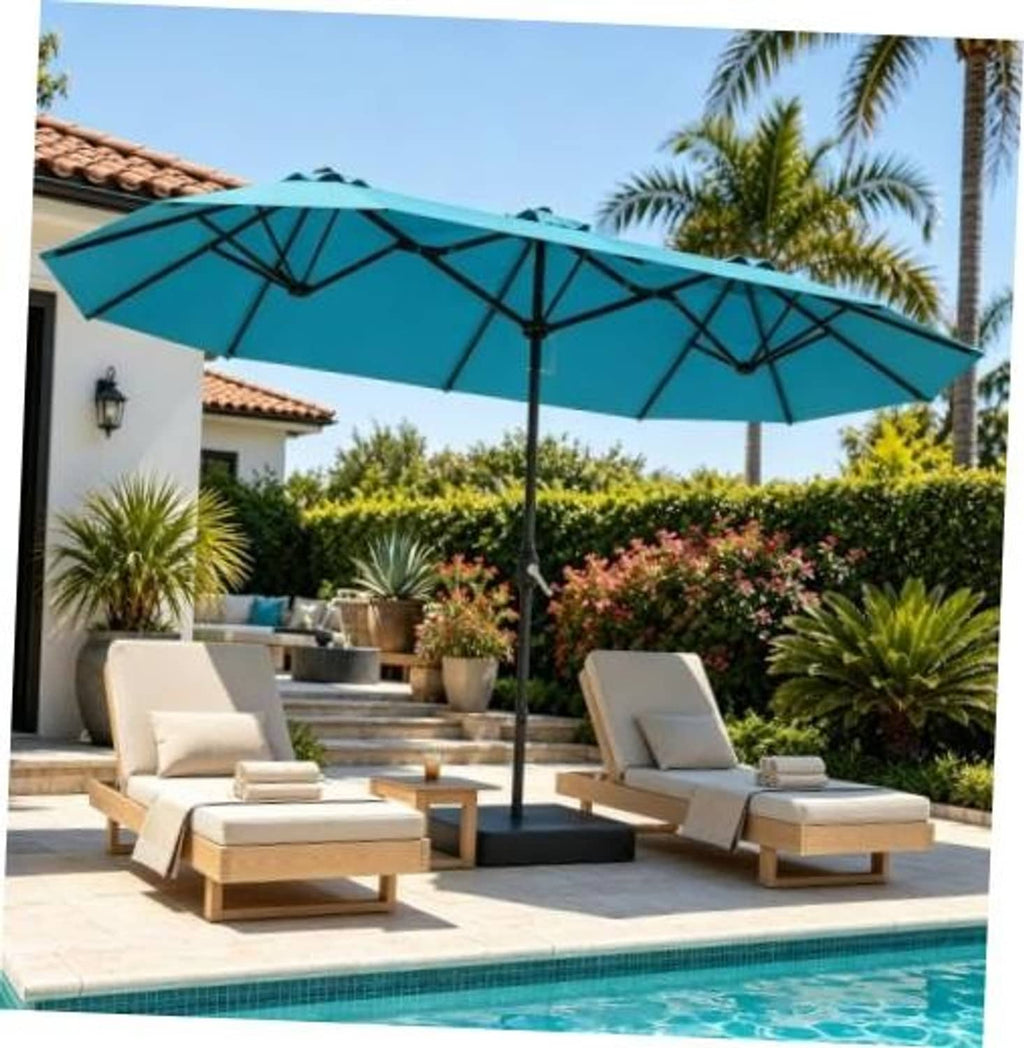 Teal cantilever-style patio umbrella with segmented ribs and central stand near pool
