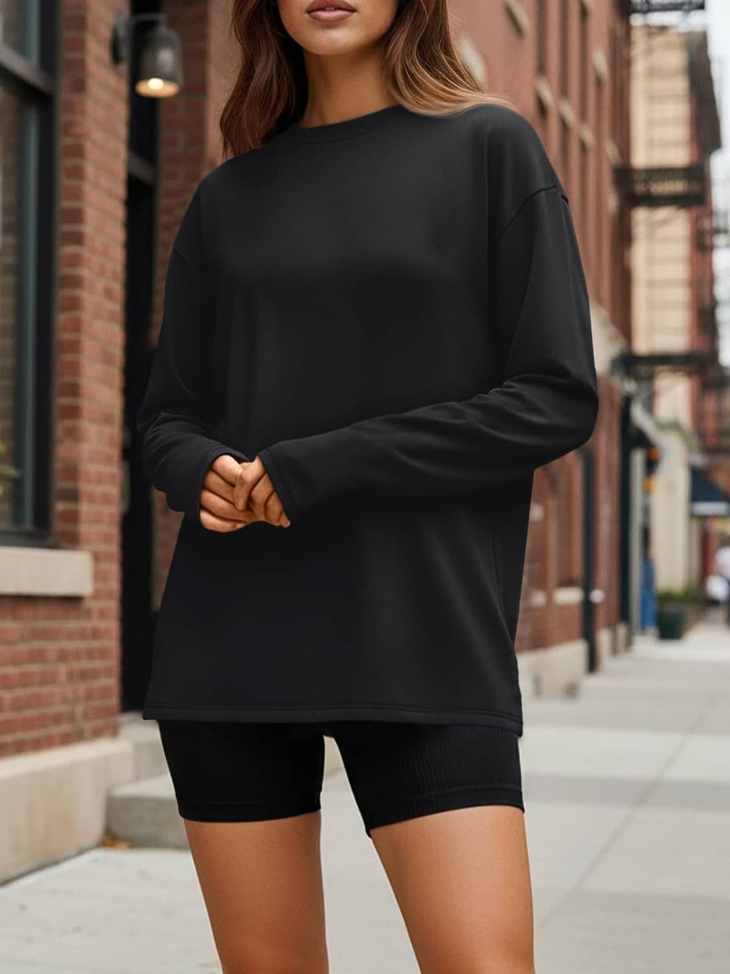 Women’s oversized long sleeve T-shirt in black, crew neck with dropped shoulders