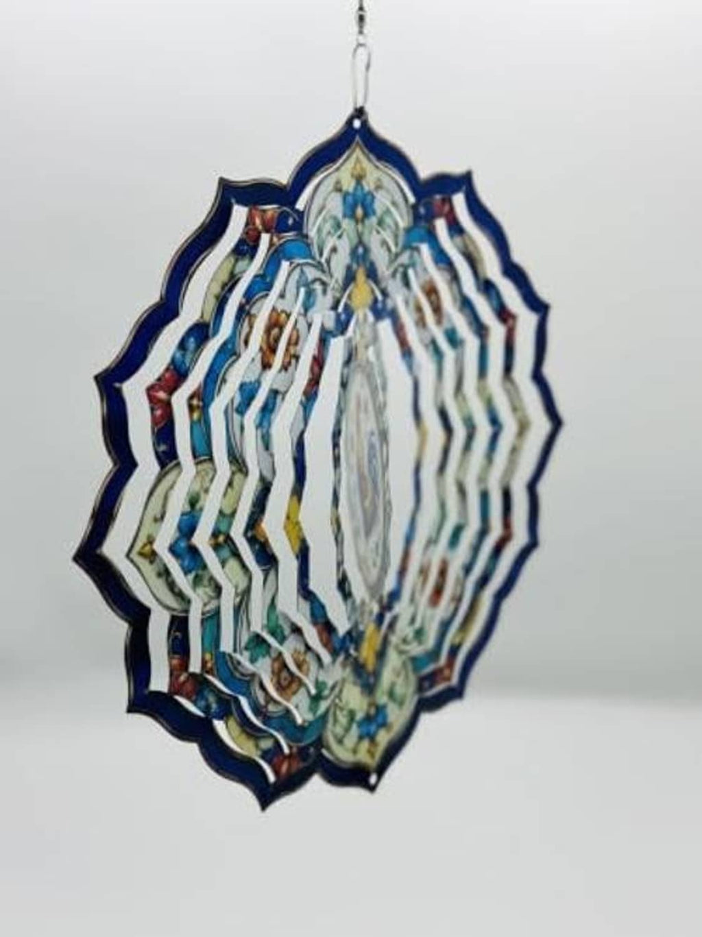 Layered blue-and-white rooster wind spinner mandala with hanging chain and hook