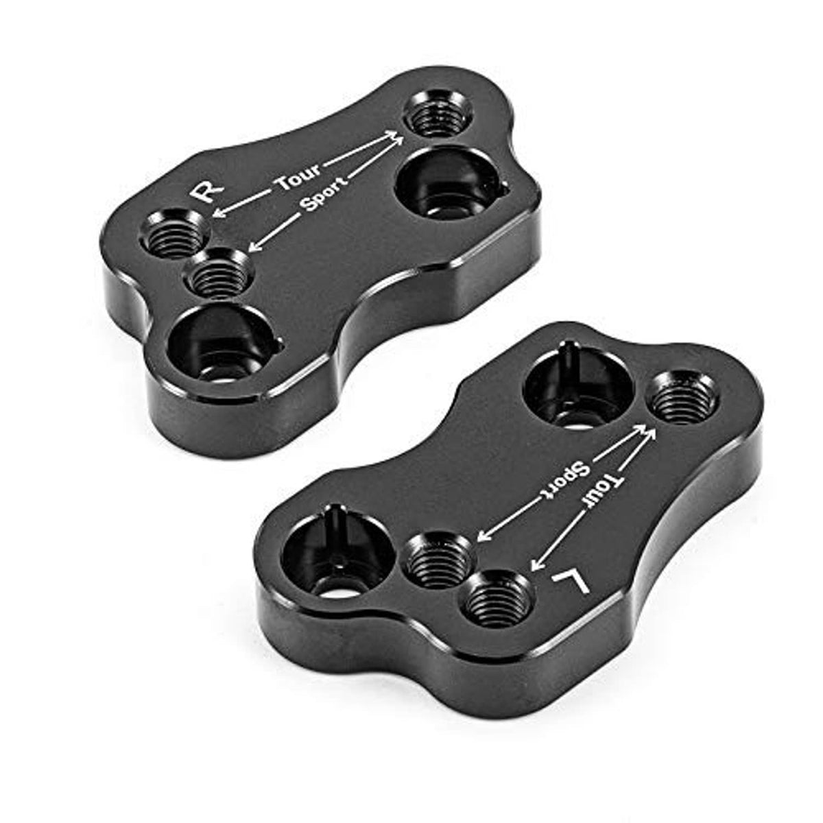 Pair of metal handlebar riser clamps, black finish, with threaded bolt holes