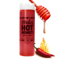 Extra hot honey squeeze bottle with red hot honey drizzle