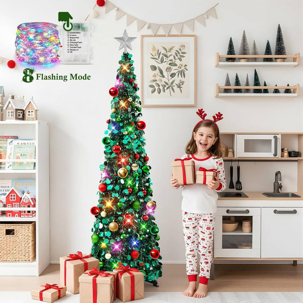 Prelit tabletop Christmas tree with star topper, green branches and flashing multicolor lights