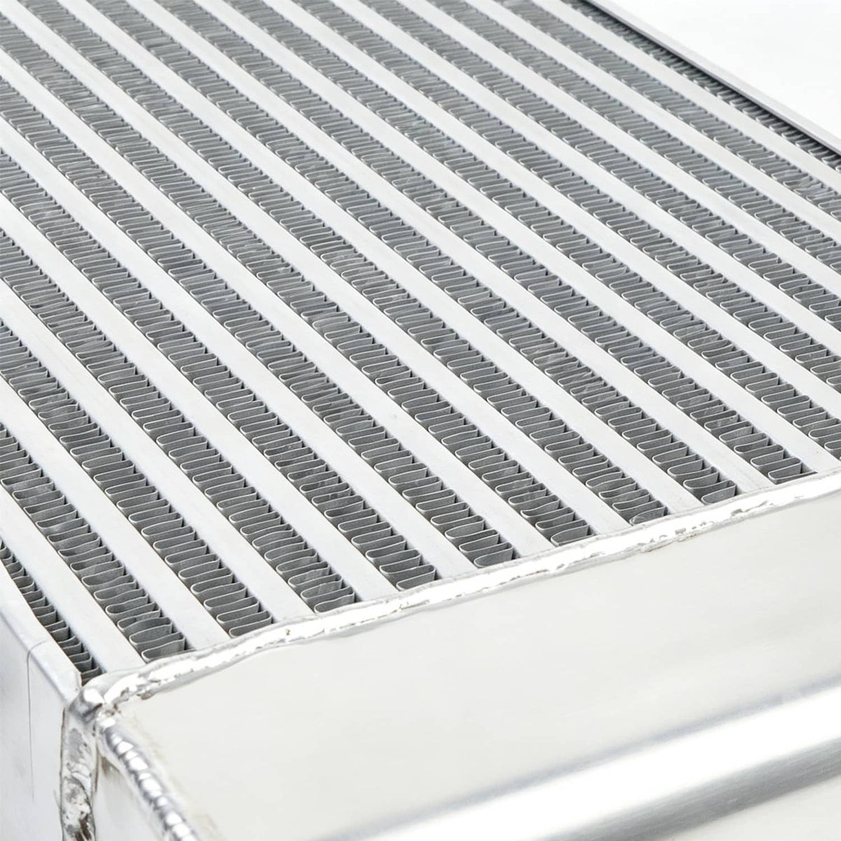 Close-up of intercooler aluminum core with dense horizontal cooling fins