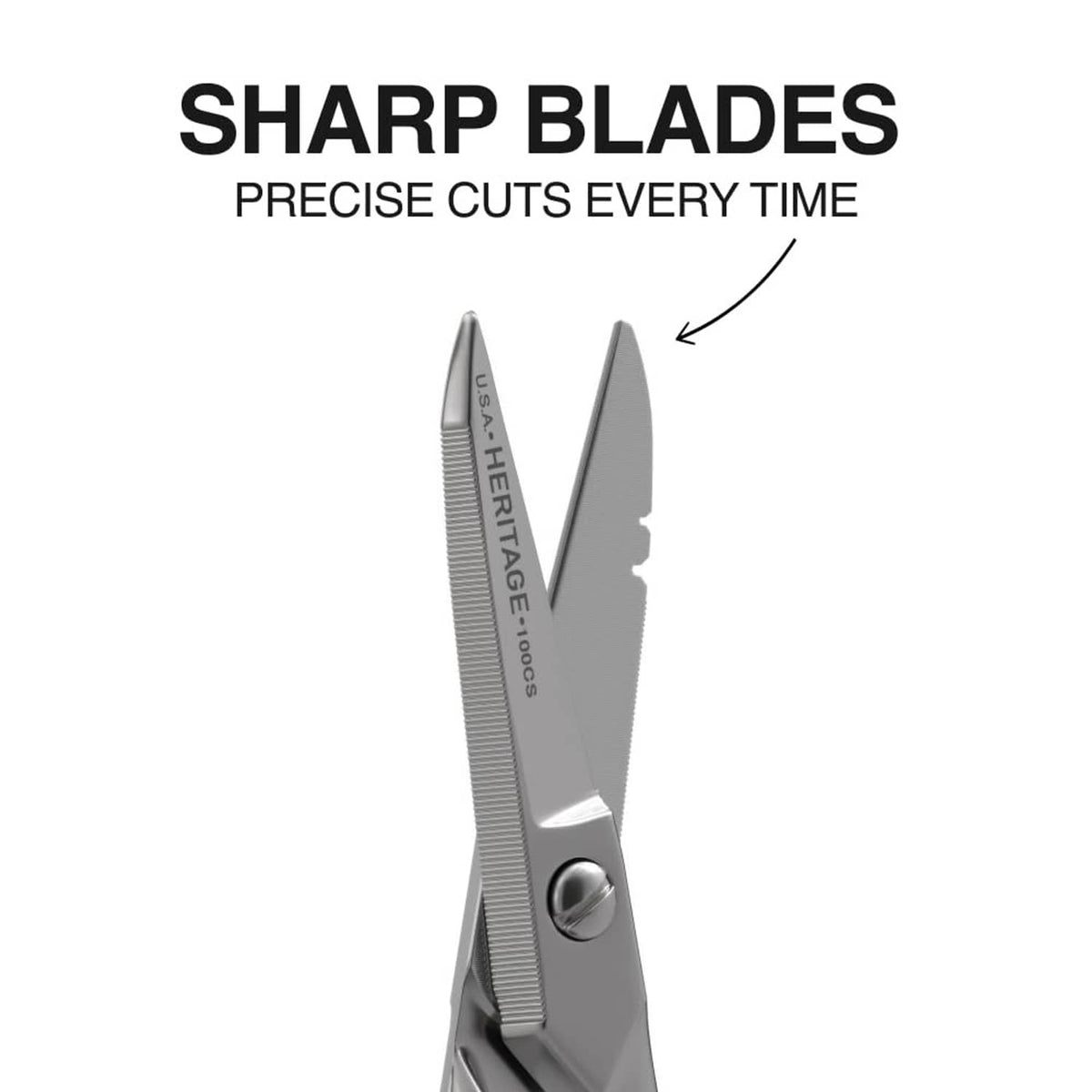 Precision scissors side view with long blades and engraved markings on the metal