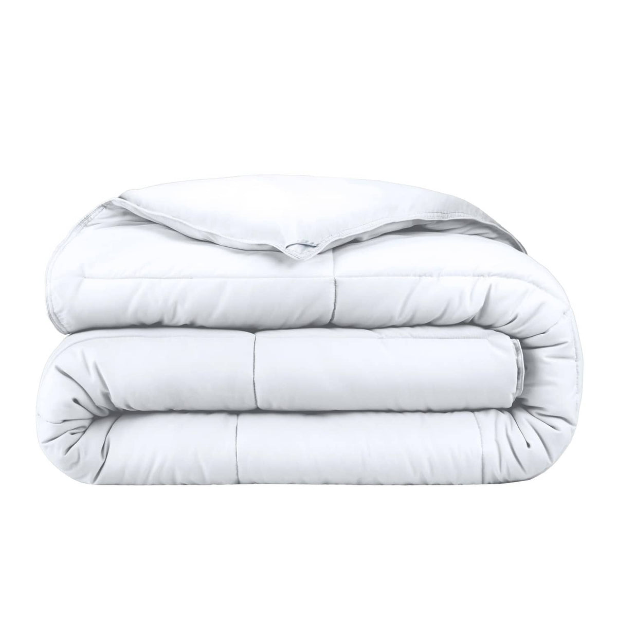White down-alternative king comforter, neatly folded with quilted baffle stitching