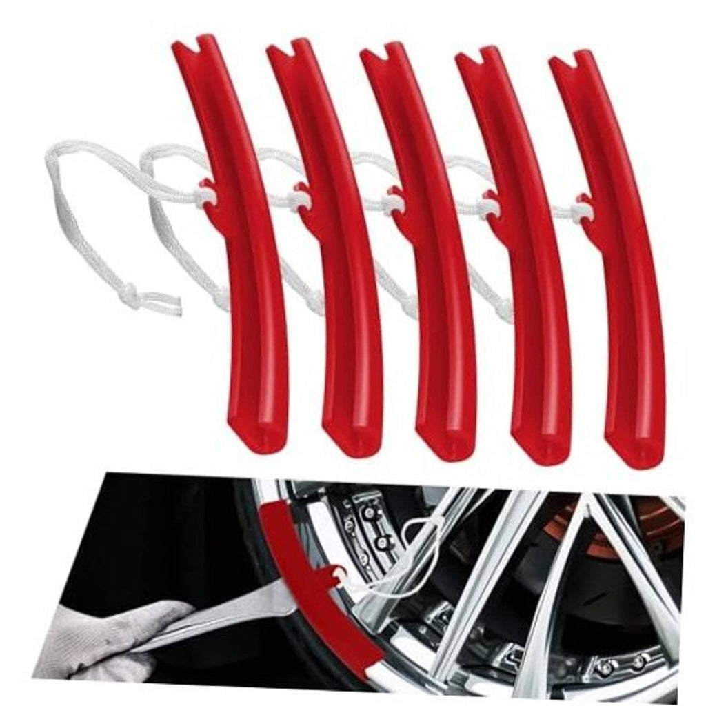 Five red wheel rim protectors with white rope ties for tire changing